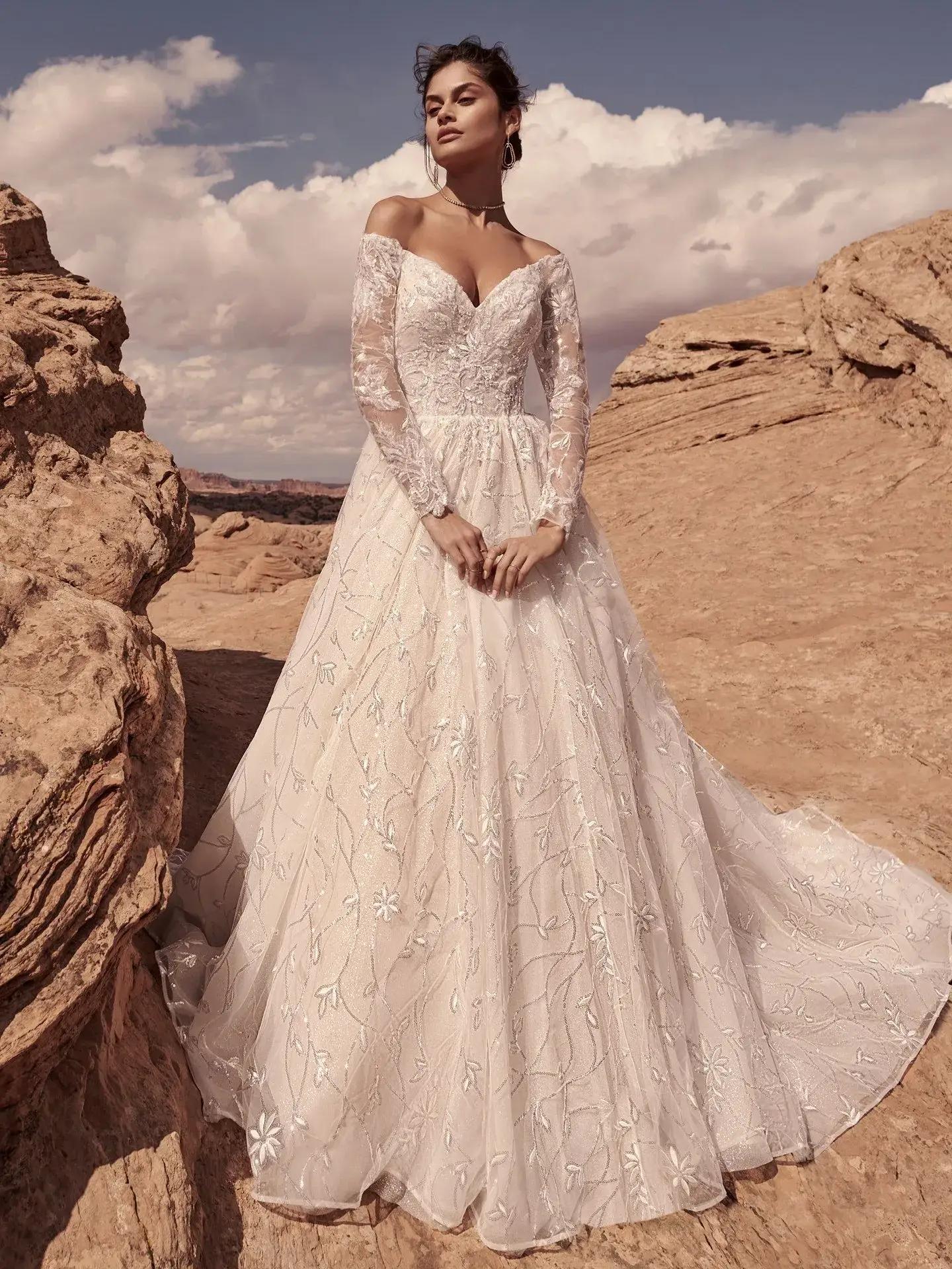 Crystal and Sequin Embellishments: Sparkling Details for Winter Wedding Dresses. Mobile Image